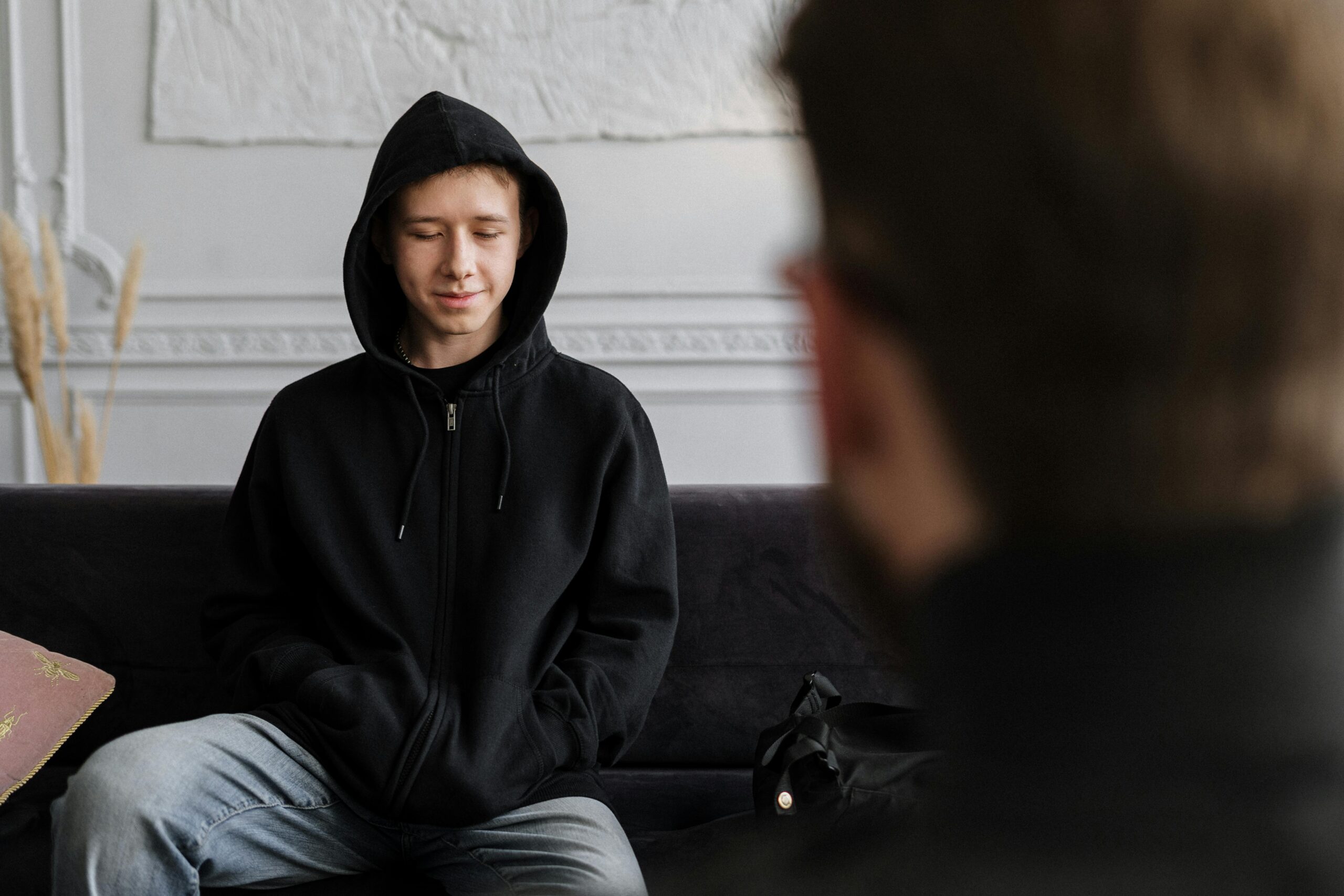 A person in a cognitive-behavioral therapy (CBT) session.