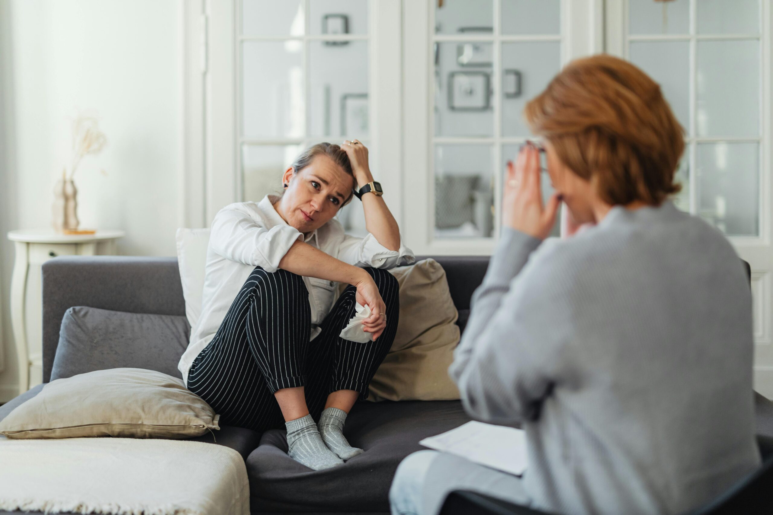 A person in a cognitive-behavioral therapy (CBT) session.