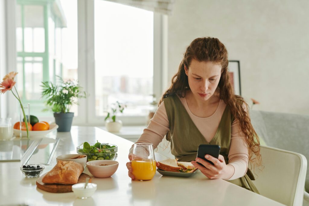 A person eating foods to improve mental health.