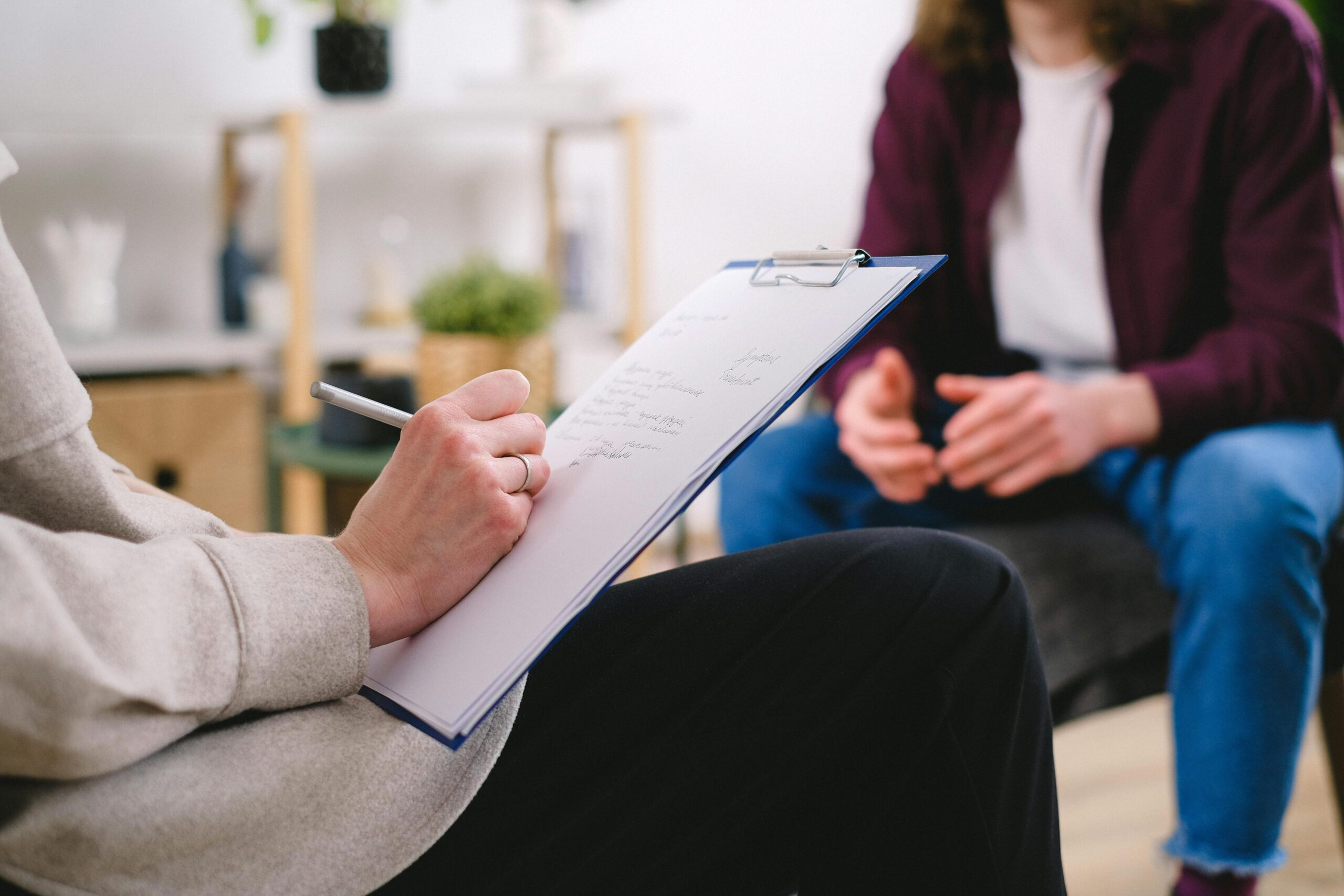 A person undergoing trauma-informed therapy.