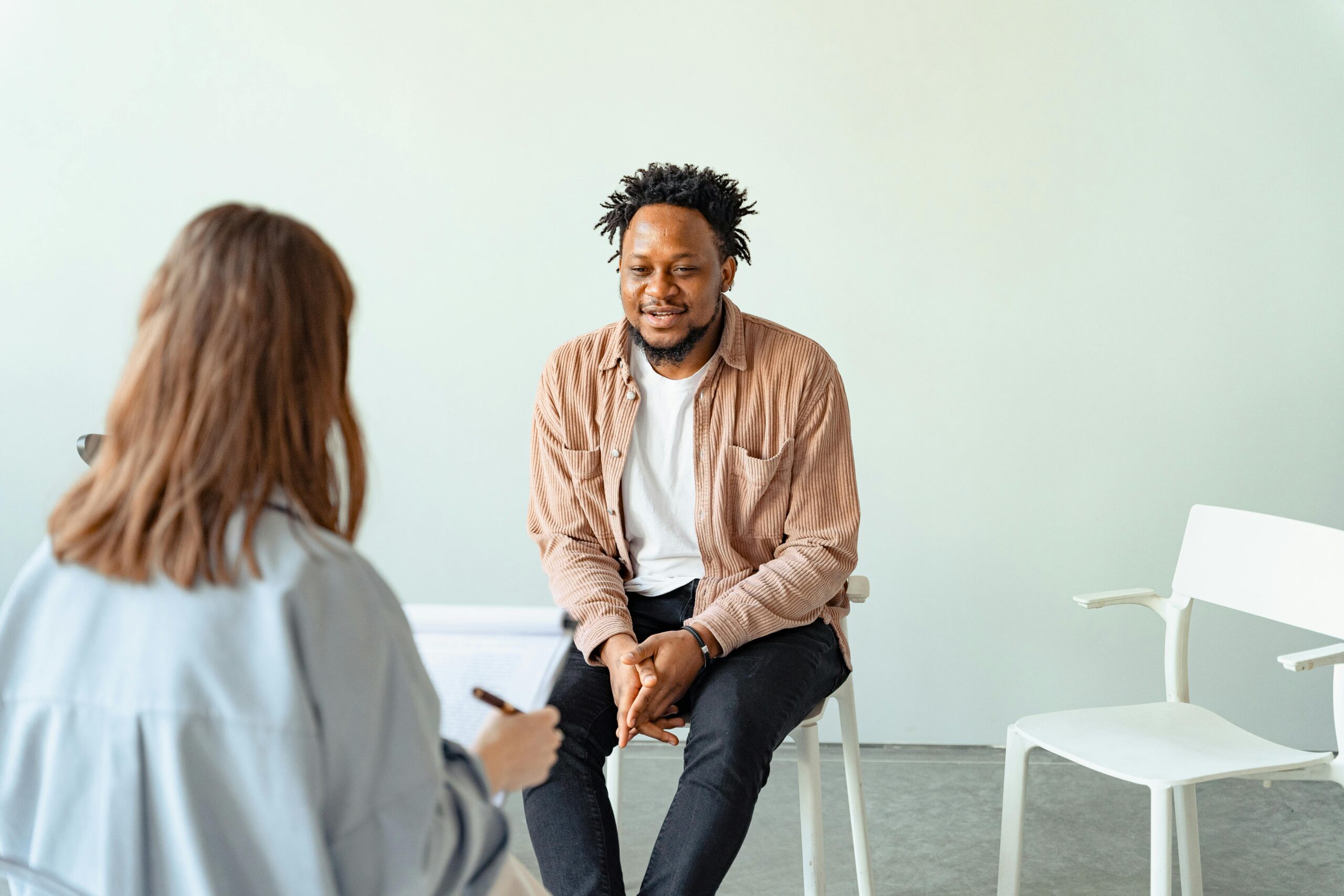 A person undergoing trauma-informed therapy.